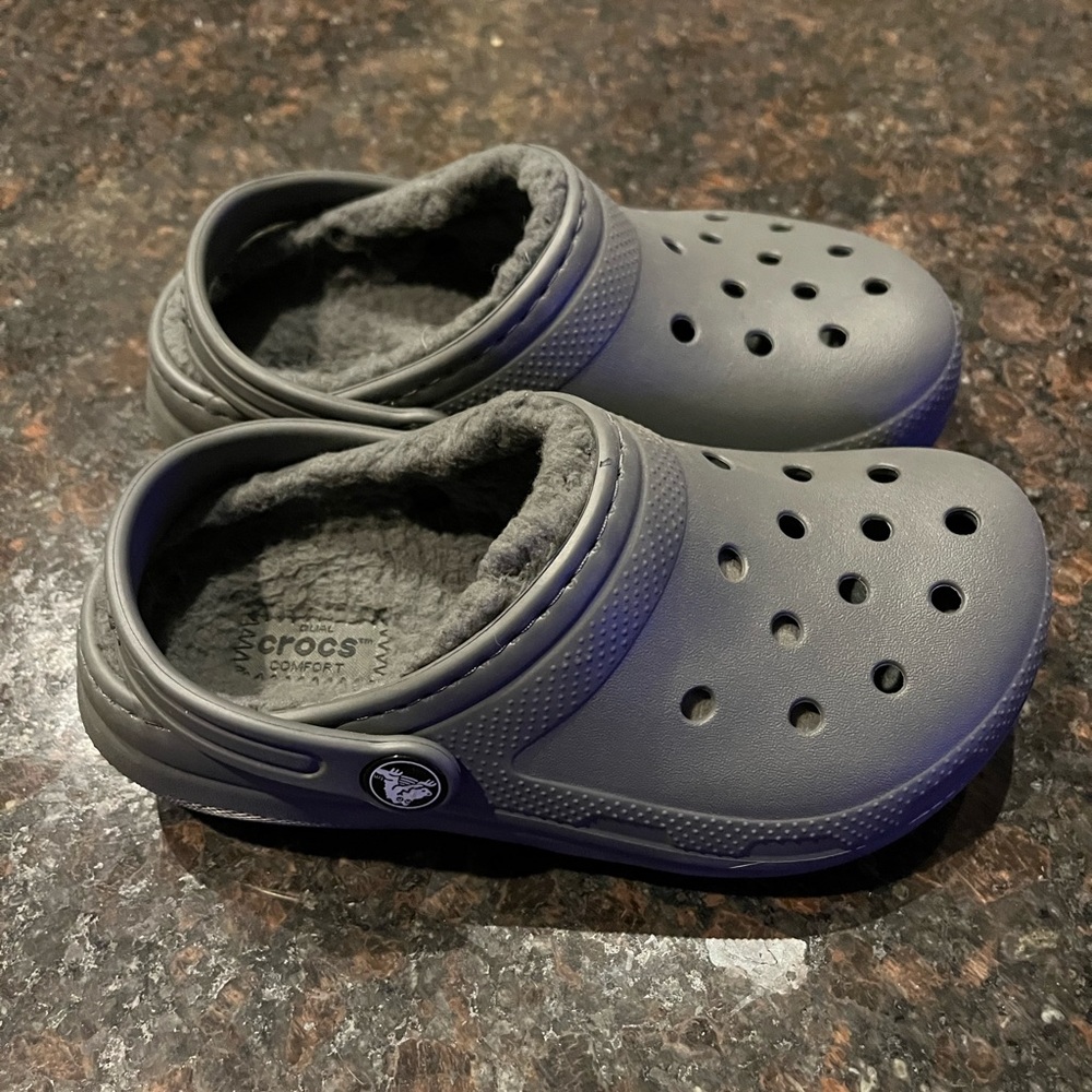 Boys lined crocs size 12 BRAND NEW! And sold out everywhere